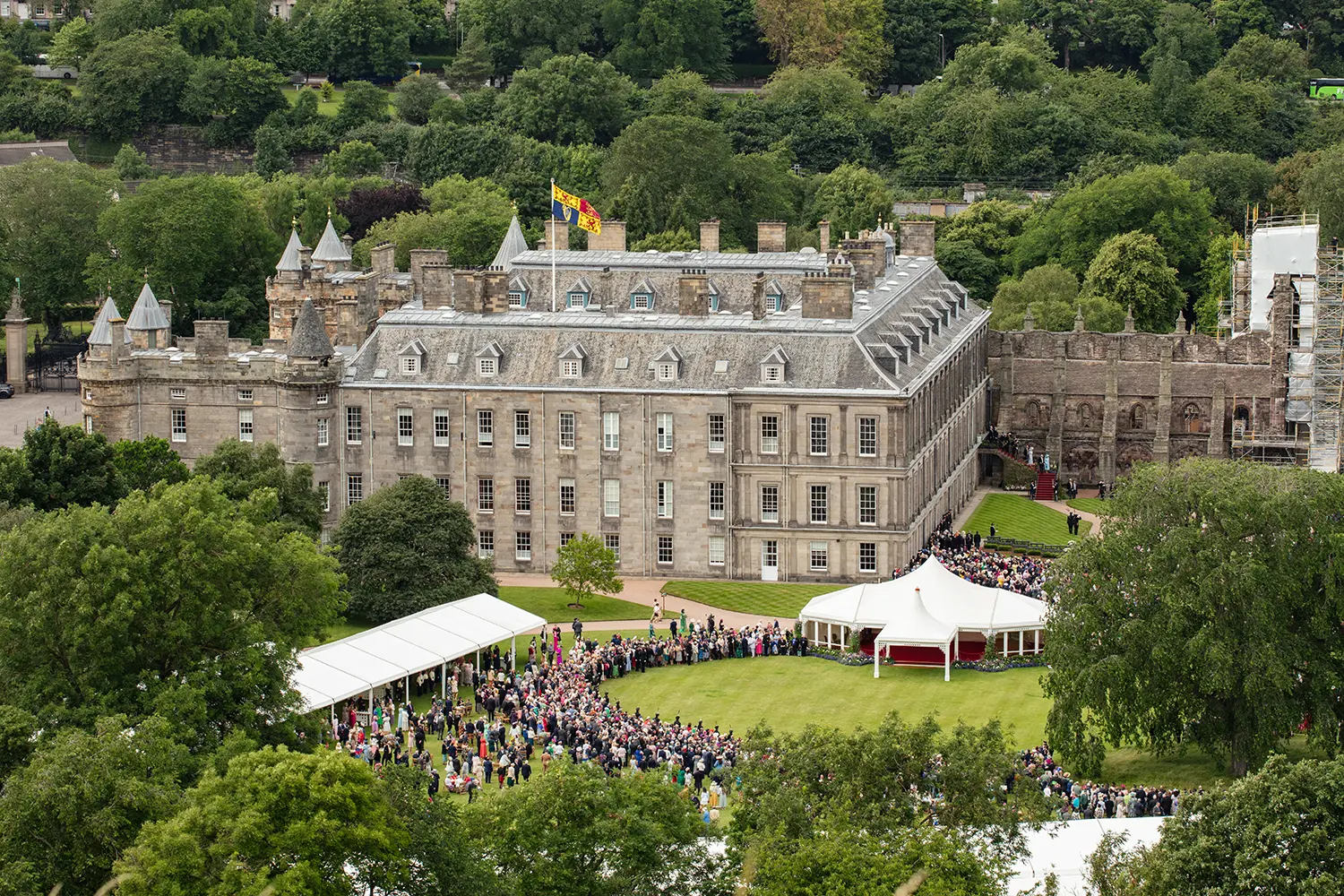 Aerial view of a garden party at the Palace of Holyroodhouse